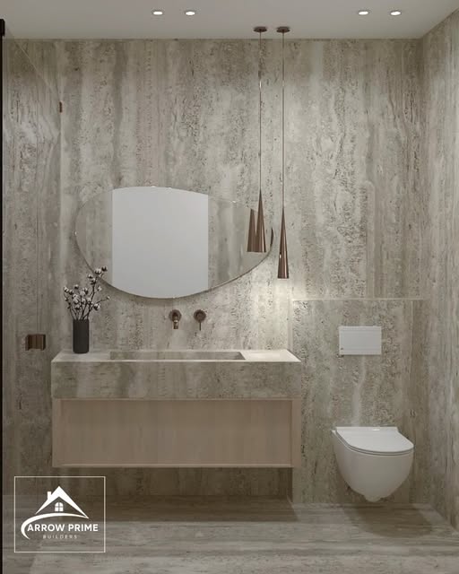 Bathroom design with travertine walls and round mirror