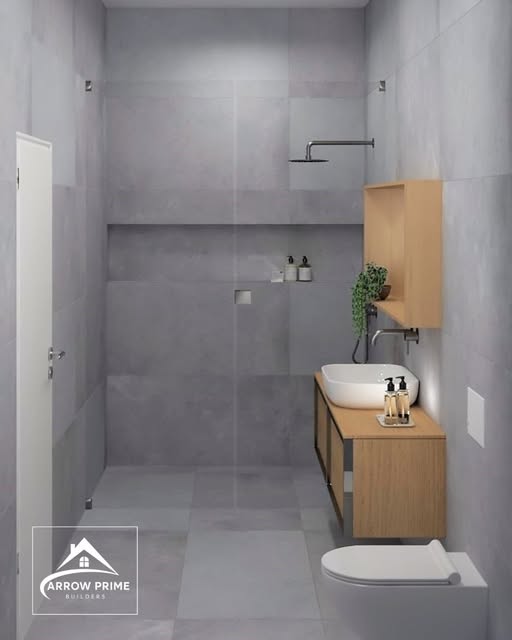 Bathroom design with grey tile and floating wood vanity
