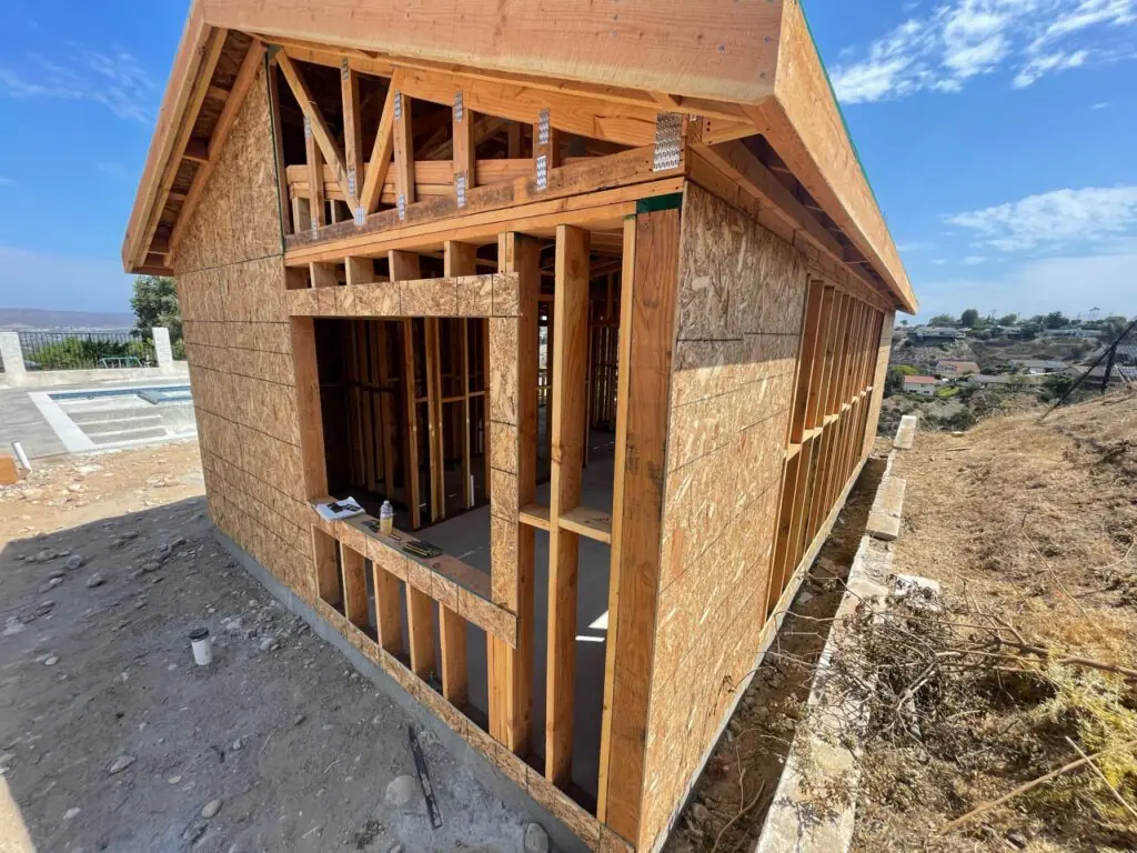 Framed and sheathed hillside ADU with trusses and hold-downs