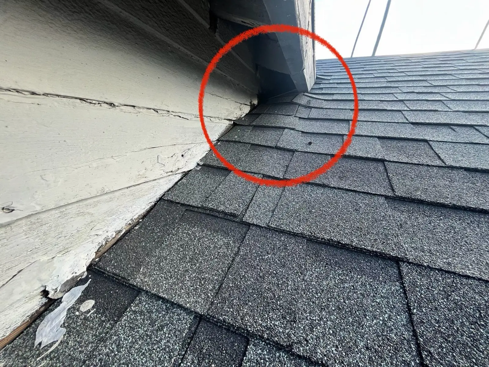 Roof inspection of missing wall flashing